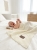 Baby_laughing_on_bed_202606111722.jpeg