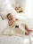 Baby_playing_on_bed_202606111722.jpeg