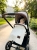 Baby_resting_in_designer_stroller_202606111725.jpeg