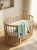 Knitted_blanket_in_luxury_crib_202606111913.jpeg