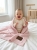 Baby_laughing_on_bed_202606111931.jpeg