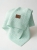 Knitted_baby_blanket_on_white_202606111735.jpeg