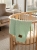 Mint_green_blanket_on_crib_202606111741 (1).jpeg