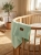 Mint_green_blanket_on_crib_202606111741.jpeg