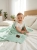 Baby_playing_on_bed_202606111745.jpeg